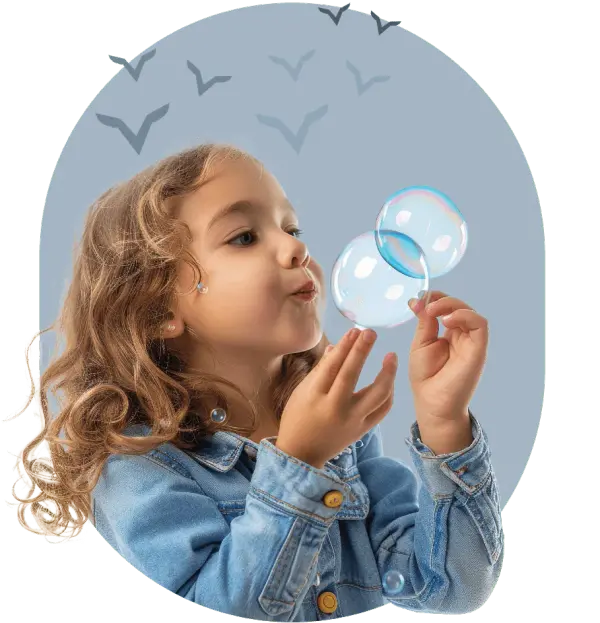 Girl blowing bubbles